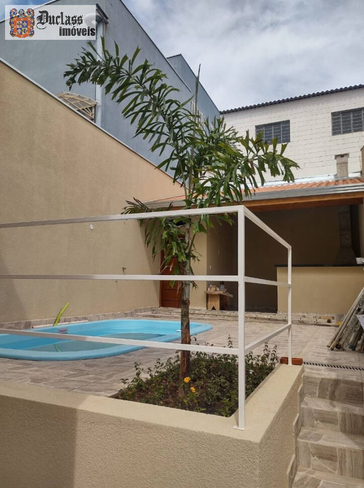 Casa à venda com 3 quartos, 127m² - Foto 1